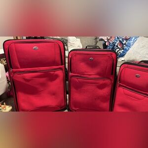 Fuschia pink luggage set